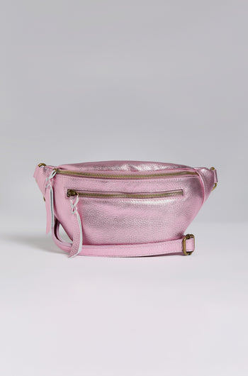 Explore Doris Maroquinerie's newest creation: the Metallic Leather Crossbody Bag, presented in shiny pink iridescent leather. It boasts a main zippered compartment, front zippered pocket, and adjustable strap for a blend of style and functionality.