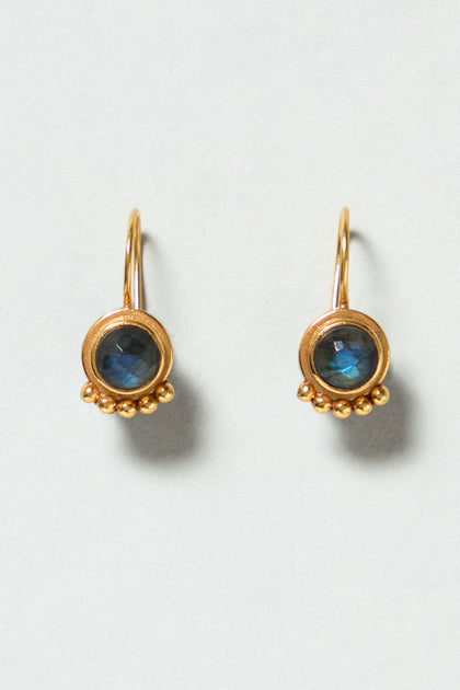 Labradorite Stone Earrings: Gold plated, featuring round labradorite gemstones in bezel settings and three gold beads below each stone. These handcrafted earrings are shown on a plain light background.