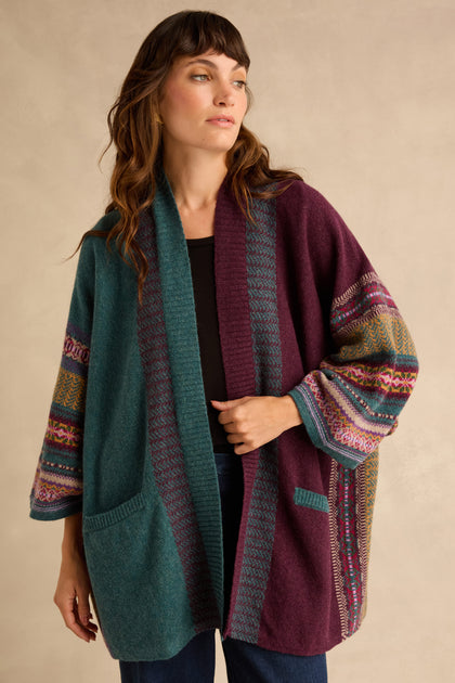 Hunter Montrose Blanket Cardigan in a color-blocked teal and purple design, featuring Fair Isle patterned sleeves and patch pockets.