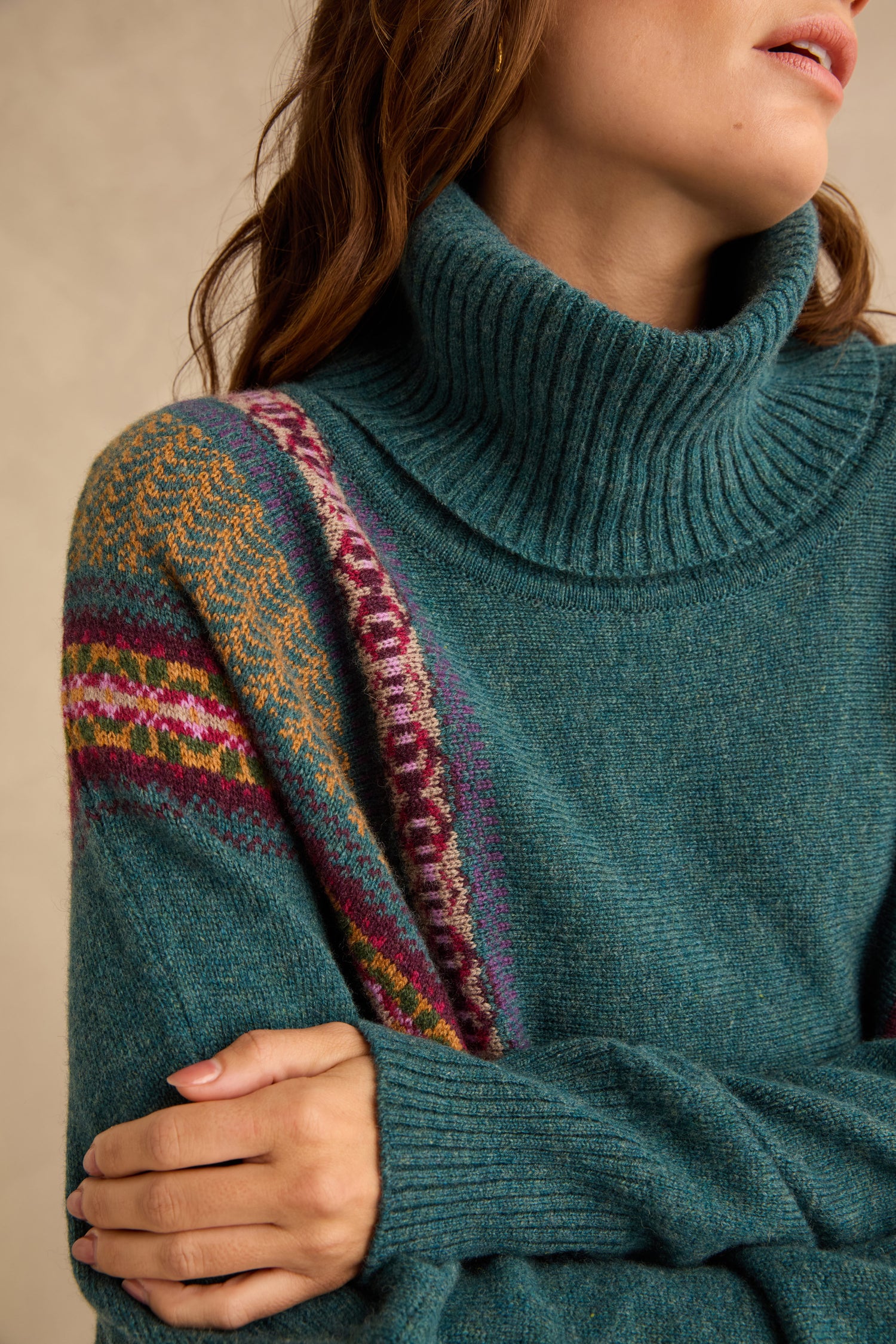Hunter Montrose Cowl Neck Sweater in teal, featuring a colorful Fair Isle patterned yoke across the shoulders.