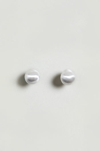 A pair of Mini Silver Pebble Earrings with a subtle silver-tone finish, displayed on a plain light background.
