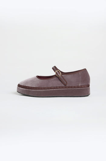 A single Taupe Velvet Platform Mary Jane Shoe with a strap and buckle, flat sole, and rounded toe, featuring a soft cotton velvet upper, displayed on a plain light background.
