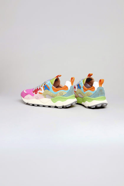 The Fuchsia Yamano 3 Colour Pop Trainers are women's outdoor sneakers featuring pink, purple, green, blue, and orange accents, white laces, a chunky sole, and mixed suede/fabric materials—shown in side profile and ideal for trekking.