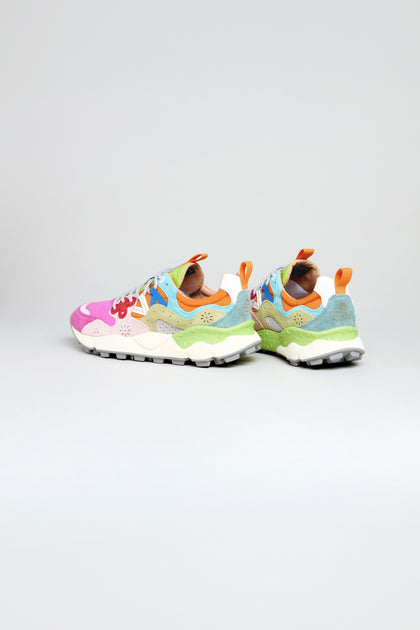 The Fuchsia Yamano 3 Colour Pop Trainers are vibrant women's outdoor sneakers with pink, blue, green, yellow, and orange patterns on white—ideal for stylish trekking.