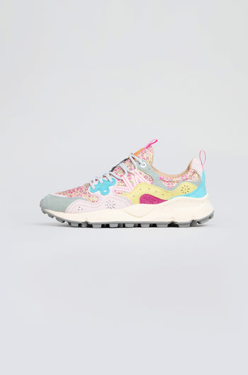 The Yamano 3 Floral Suede Nylon Trainers feature a multicolored floral pattern, blue laces, and a white sole, combining trekking-inspired design with vibrant suede accents, shown on a simple light background.
