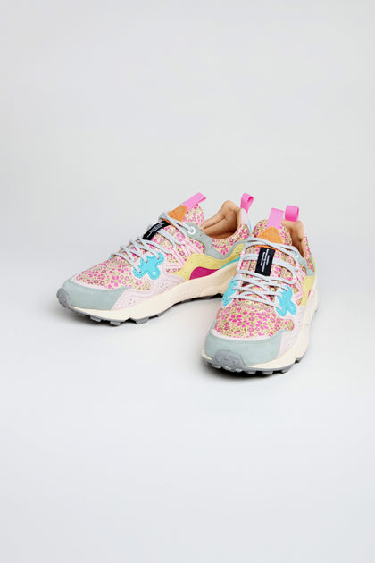 A pair of Yamano 3 Floral Suede Nylon Trainers with pink, yellow, blue, and beige patterns, white soles, and pink heel tabs is displayed on a light background.