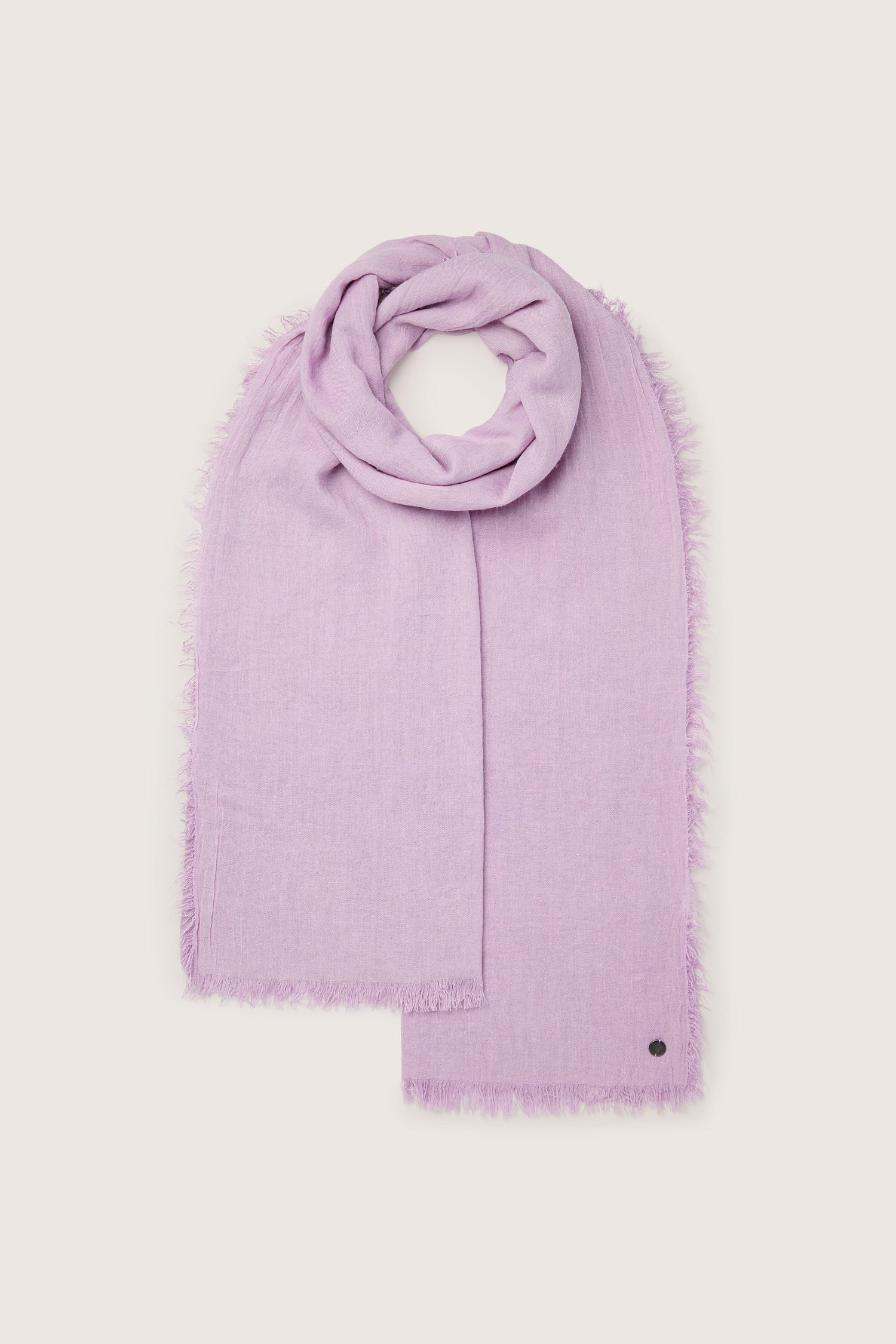 A versatile Soft Fringe Scarf in purple displayed on a white background.