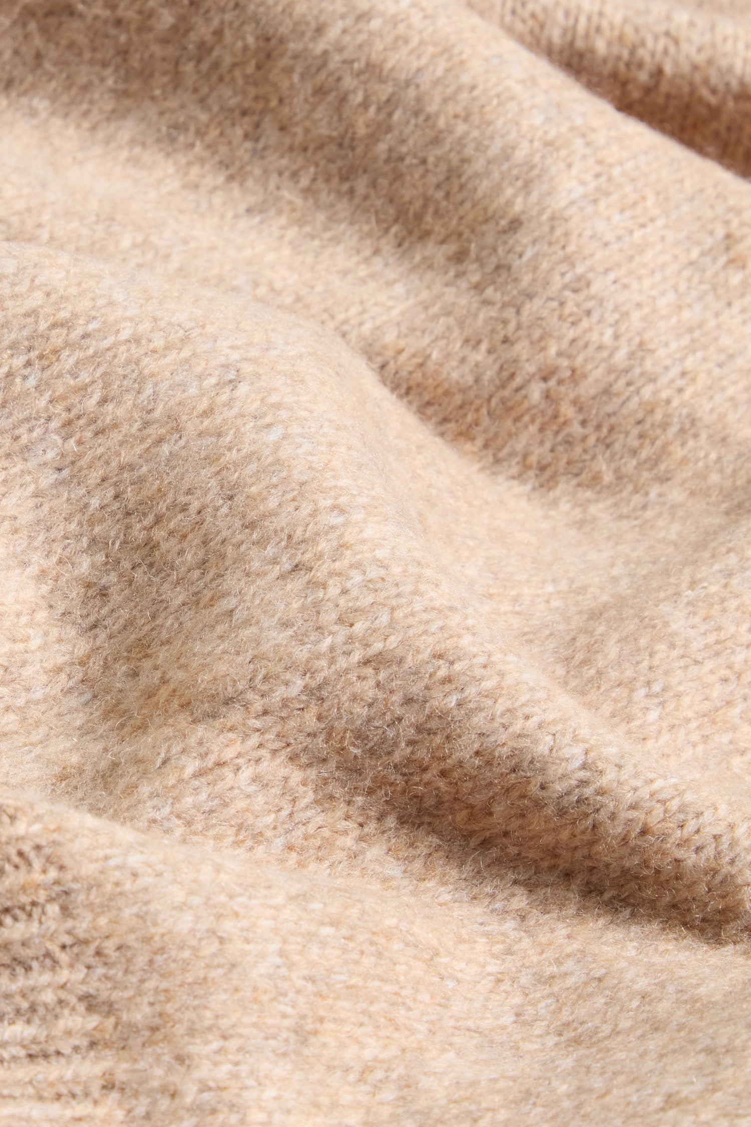 Close-up of the Wool Mix Sand Scarf by FRAAS, highlighting its soft texture and gentle folds.