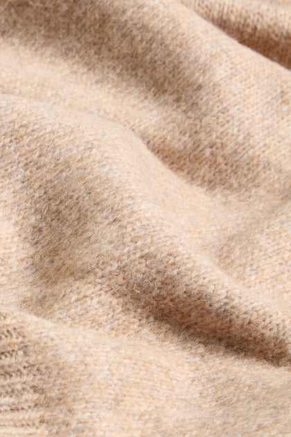 Close-up of the Wool Mix Sand Scarf by FRAAS, highlighting its soft texture and gentle folds.