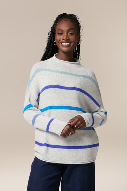A woman wearing a Mohair Blend Stripe Sweater.