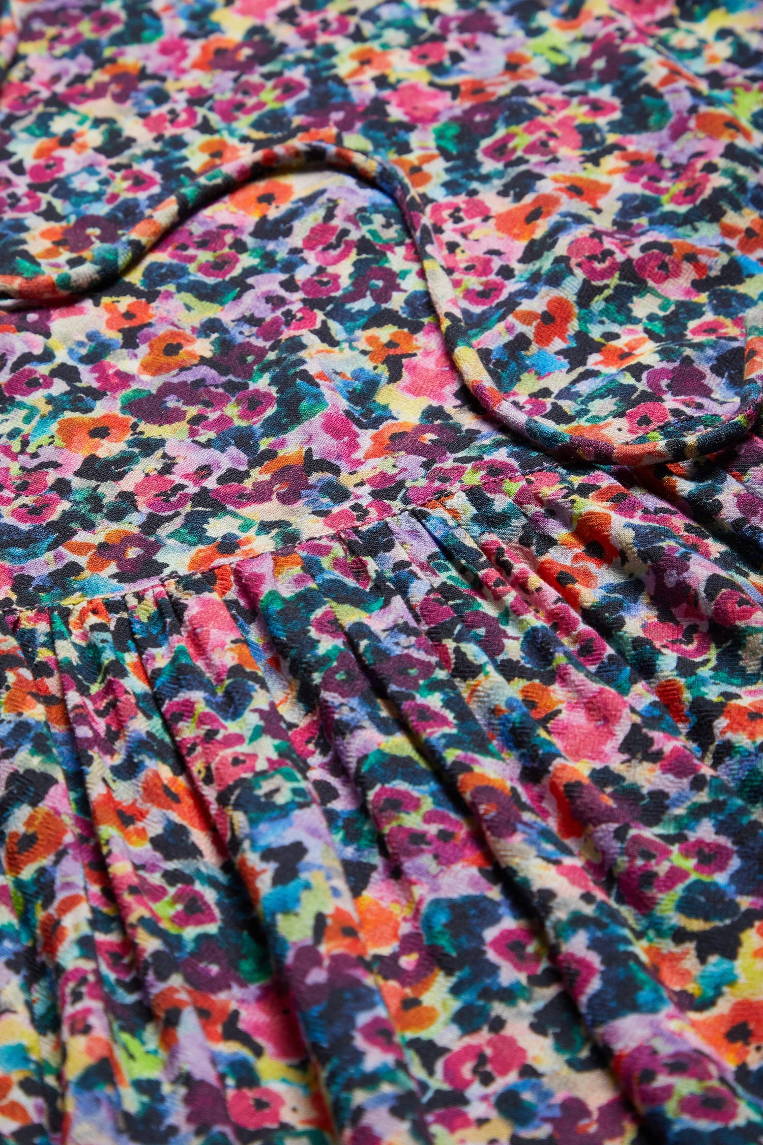 A chic and sustainable close up of the Miniature Floral Garden Dress.