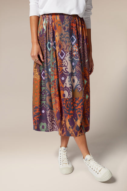 A bohemian beauty wearing a colorful Ikat Print Twill Skirt.
