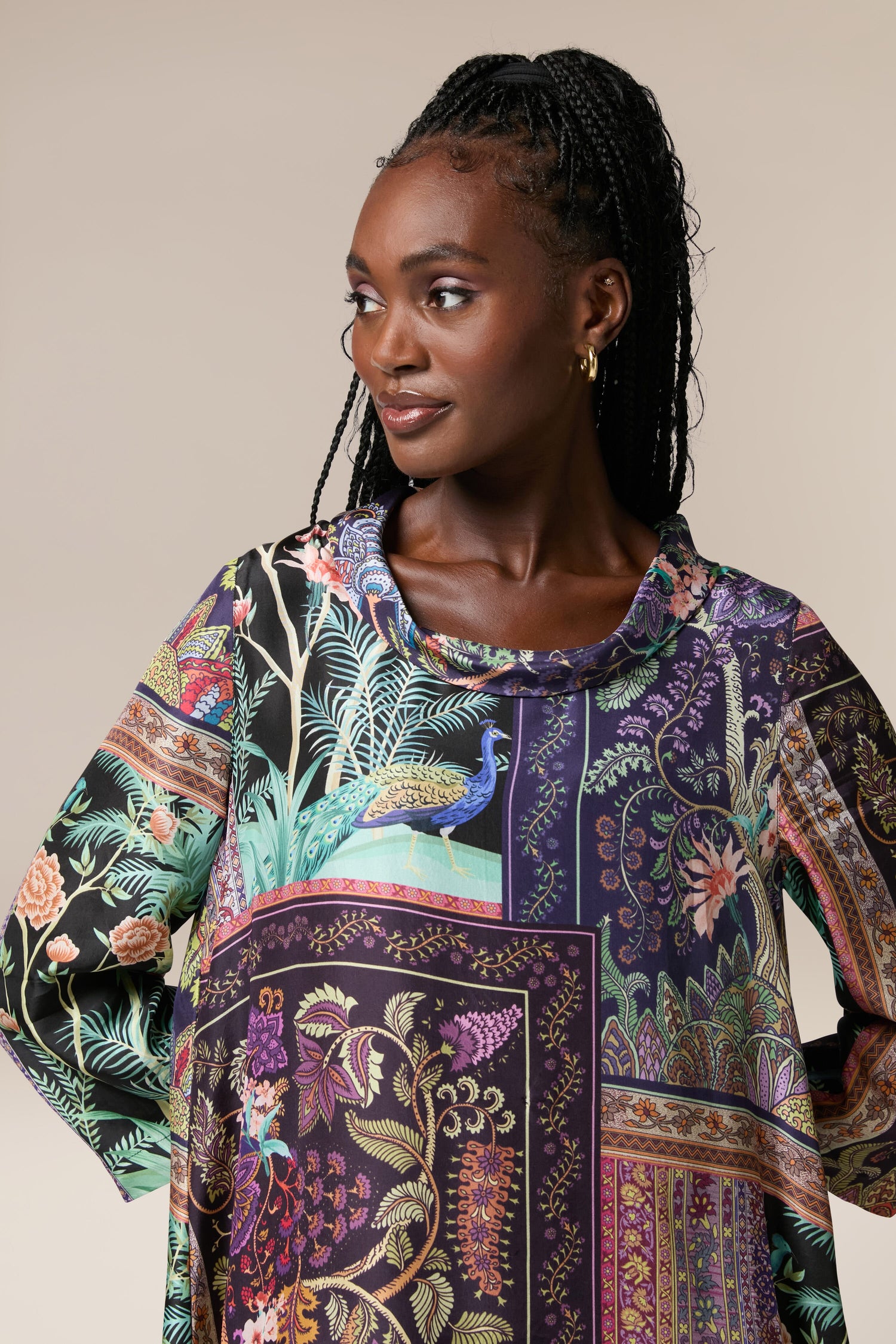 A woman wearing a Mythical Print Silk Tunic, embodying a bohemian aesthetic.