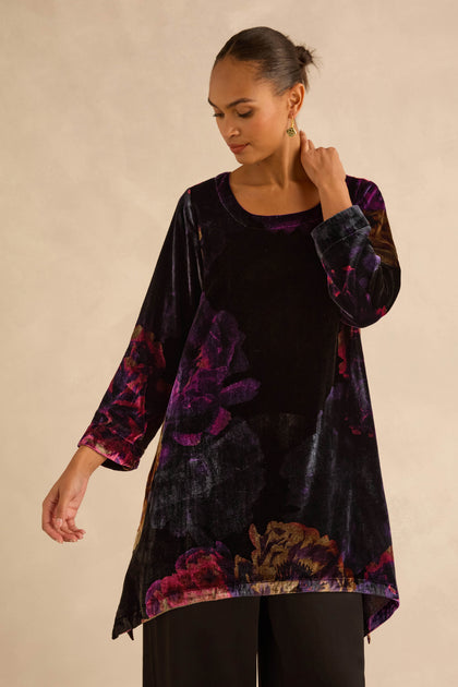 Midnight Peonies Velvet Tunic in black with purple, dark-toned floral prints, three-quarter length sleeves, and a fit-and-flare silhouette.