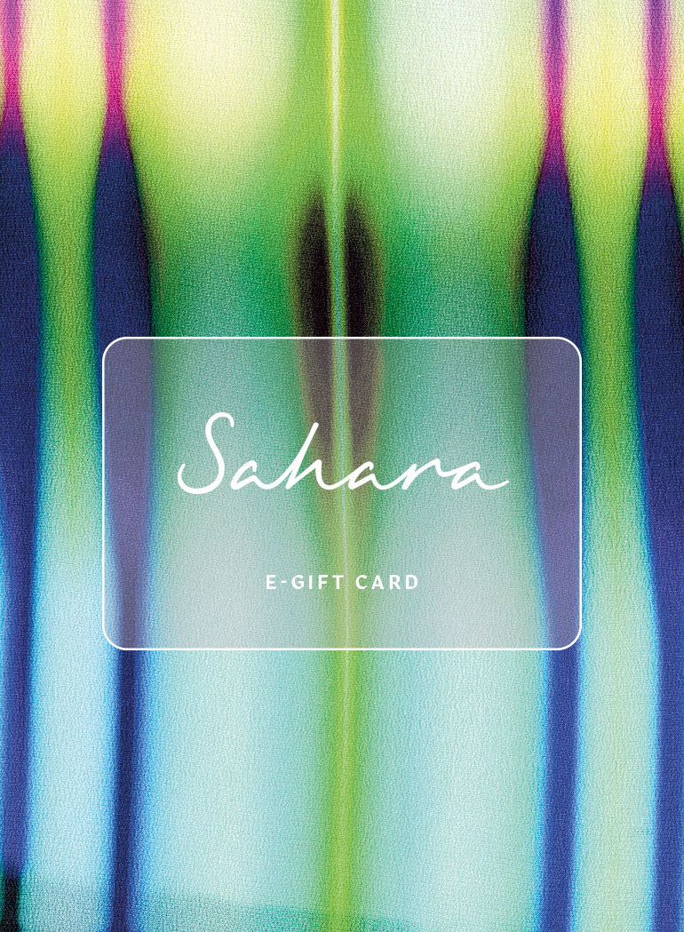 The Sahara E-Gift Card, shown on a blurred green, blue, yellow, and purple background, is the ideal online gift card for any occasion.