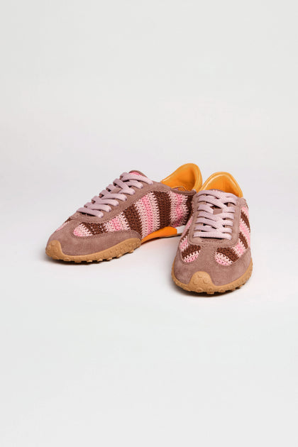 Bridge Woven Brown Crochet Trainers featuring pink, brown, and cream striped knit uppers, leather panels, pink laces, orange interior lining, and tan rubber soles are displayed against a plain white background.