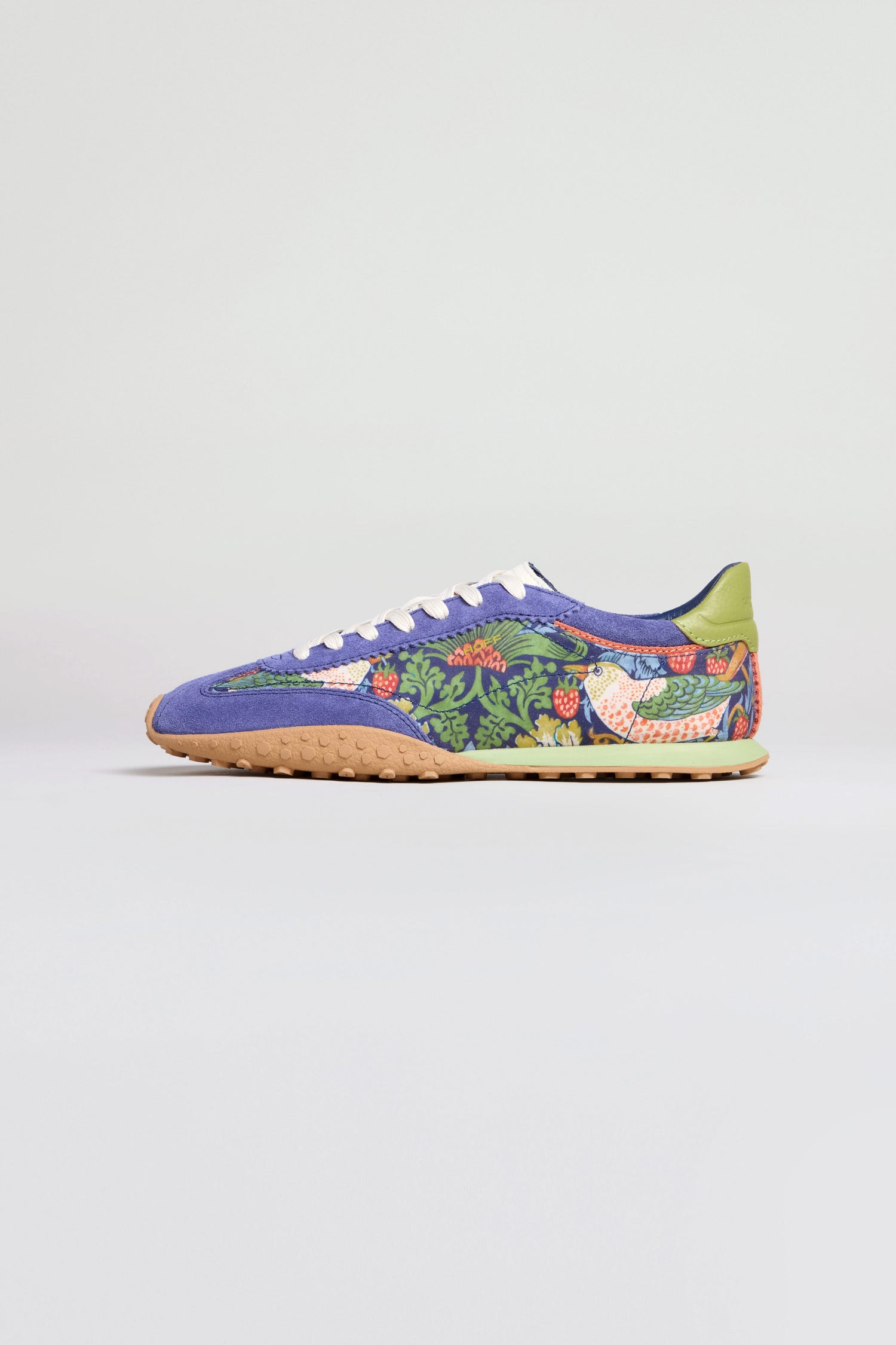The William Morris Bridge Trainers feature the iconic Strawberry Thief print, white laces, a green heel tab, and a tan sole—ideal for fans of stylish Hoff sneakers.