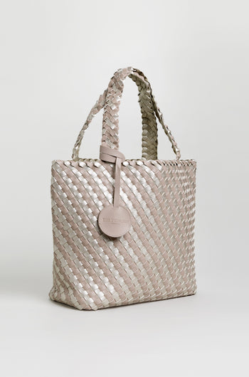 A Woven Reversible Grey & Silver Bag with two handles and a round attached tag, shown against a plain white background.