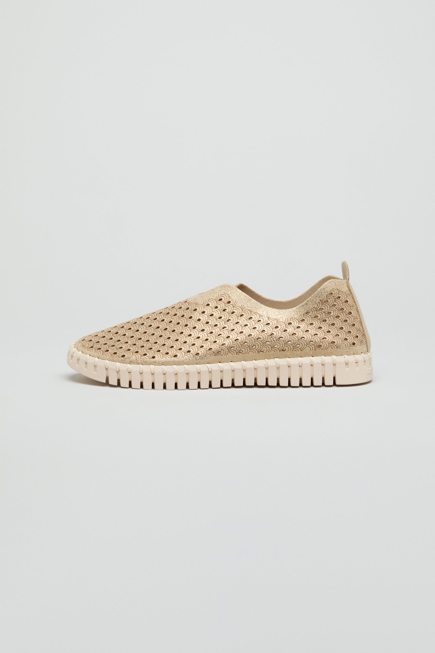A beige Tulip Glitter Slip on Shoe by Ilse Jacobsen, featuring a perforated woven design and textured sole, is displayed in profile against a plain light background.