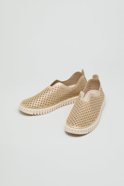 A pair of beige Tulip Glitter Slip on Shoes by Ilse Jacobsen, featuring lightweight perforated uppers and white textured soles, displayed on a plain light background.
