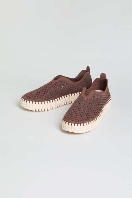 Tulip Platform Slip On Shoes in brown, featuring perforated recycled microfiber uppers and white textured soles, crafted for breathability and shown against a plain light background.