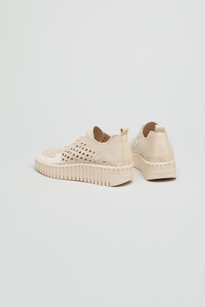 A pair of Tulip Embroidered Platform Lace Up Trainers, beige with woven texture and textured soles, inspired by Ilse Jacobsen Tulip style, displayed against a plain white background.