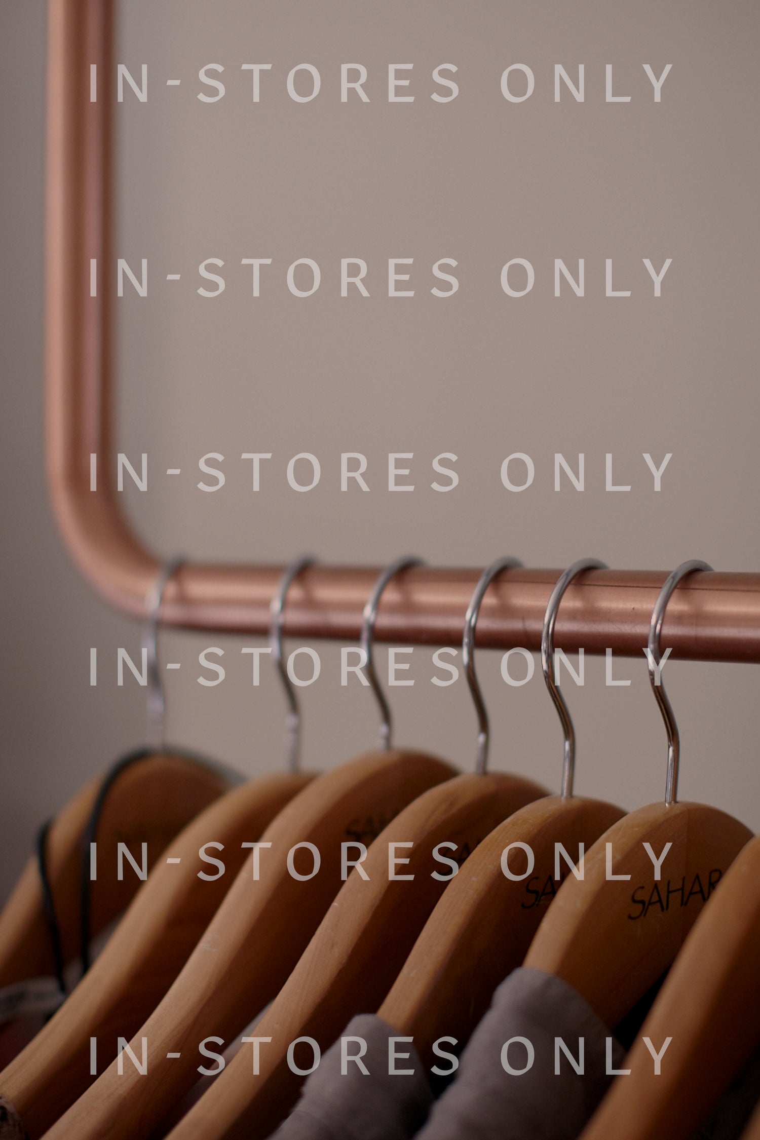 In-stores only - copper hanger featuring Dotty Necklace.