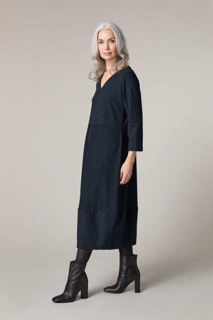 A woman wearing a Stripe Lurex Jersey Dress.