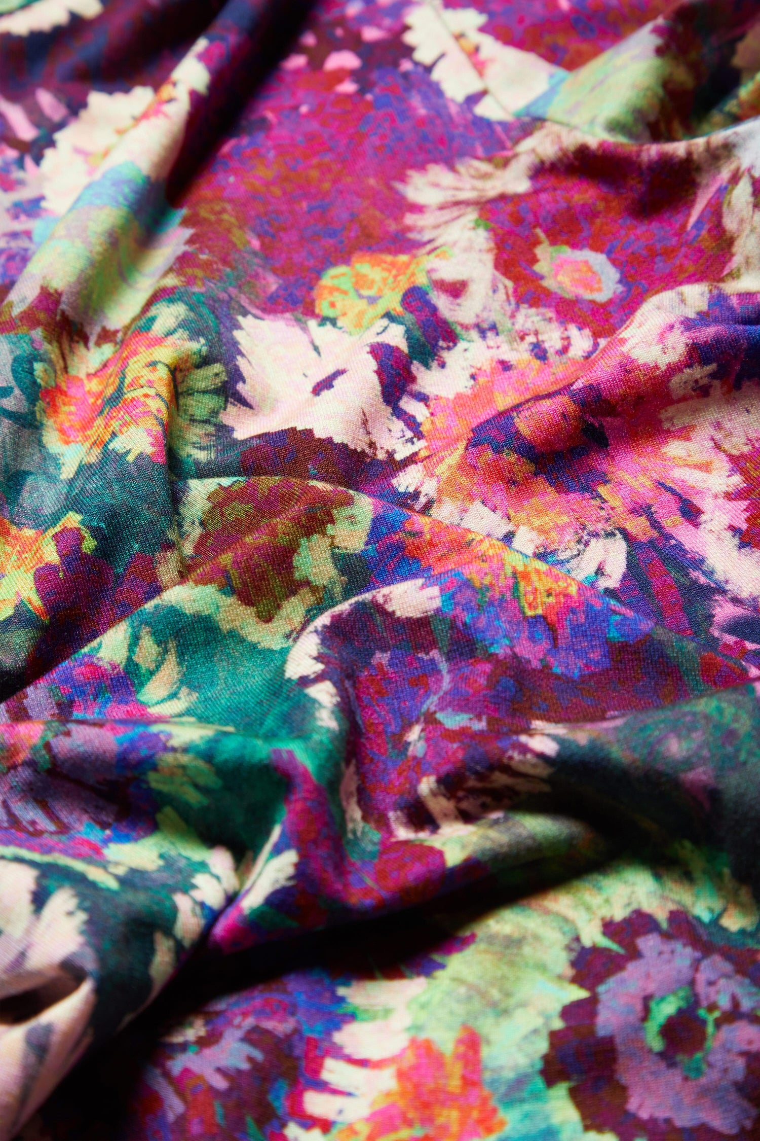 A moody close up of a Midnight Garden Jersey Polo Neck.