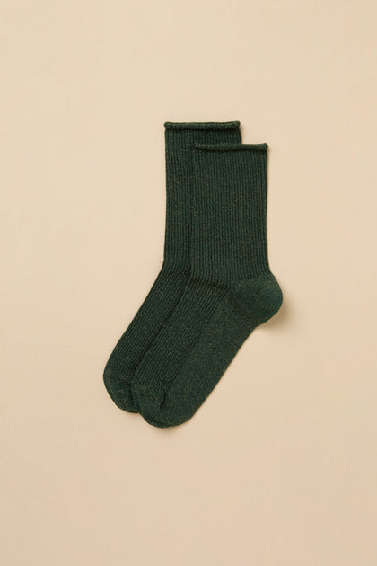 Pair of dark green Forest Bamboo Sparkle Socks in a lyocell-blend with a ribbed texture and subtle metallic flecks.
