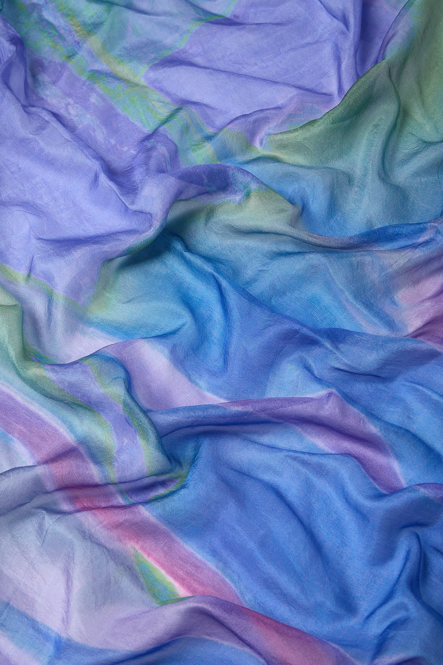 Luxurious, colorful Lilac Sky Silk Scarf with a wavy texture.