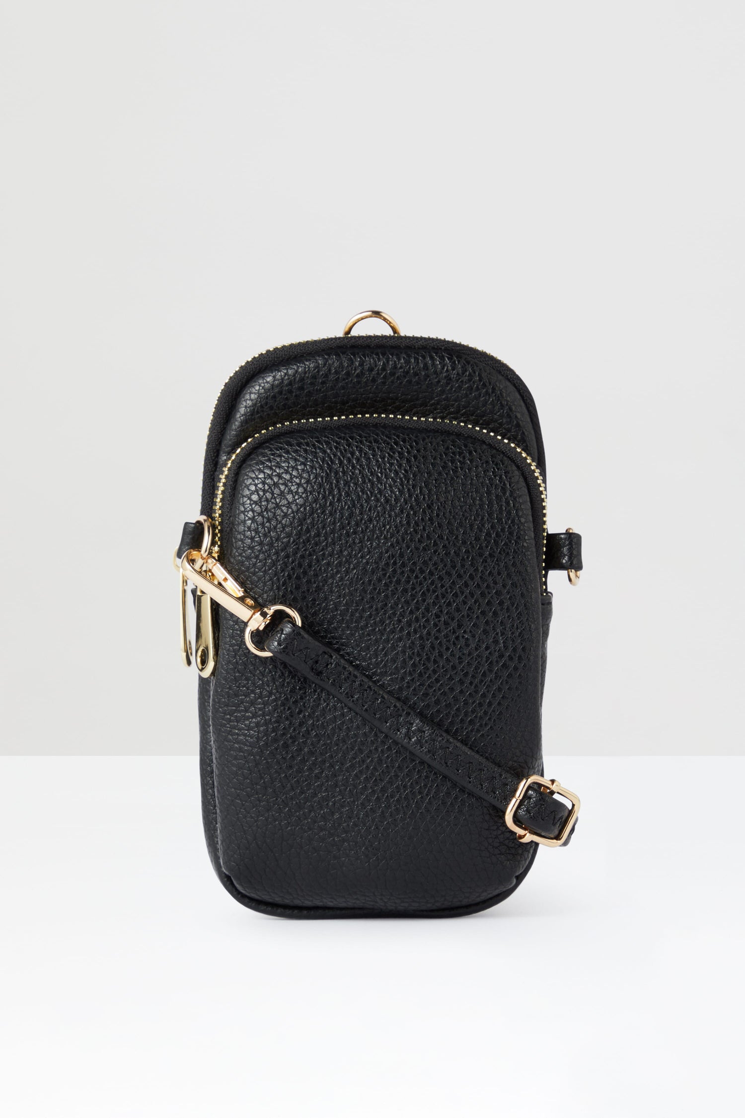 A black leather Mini Crossbody Bag with gold hardware.