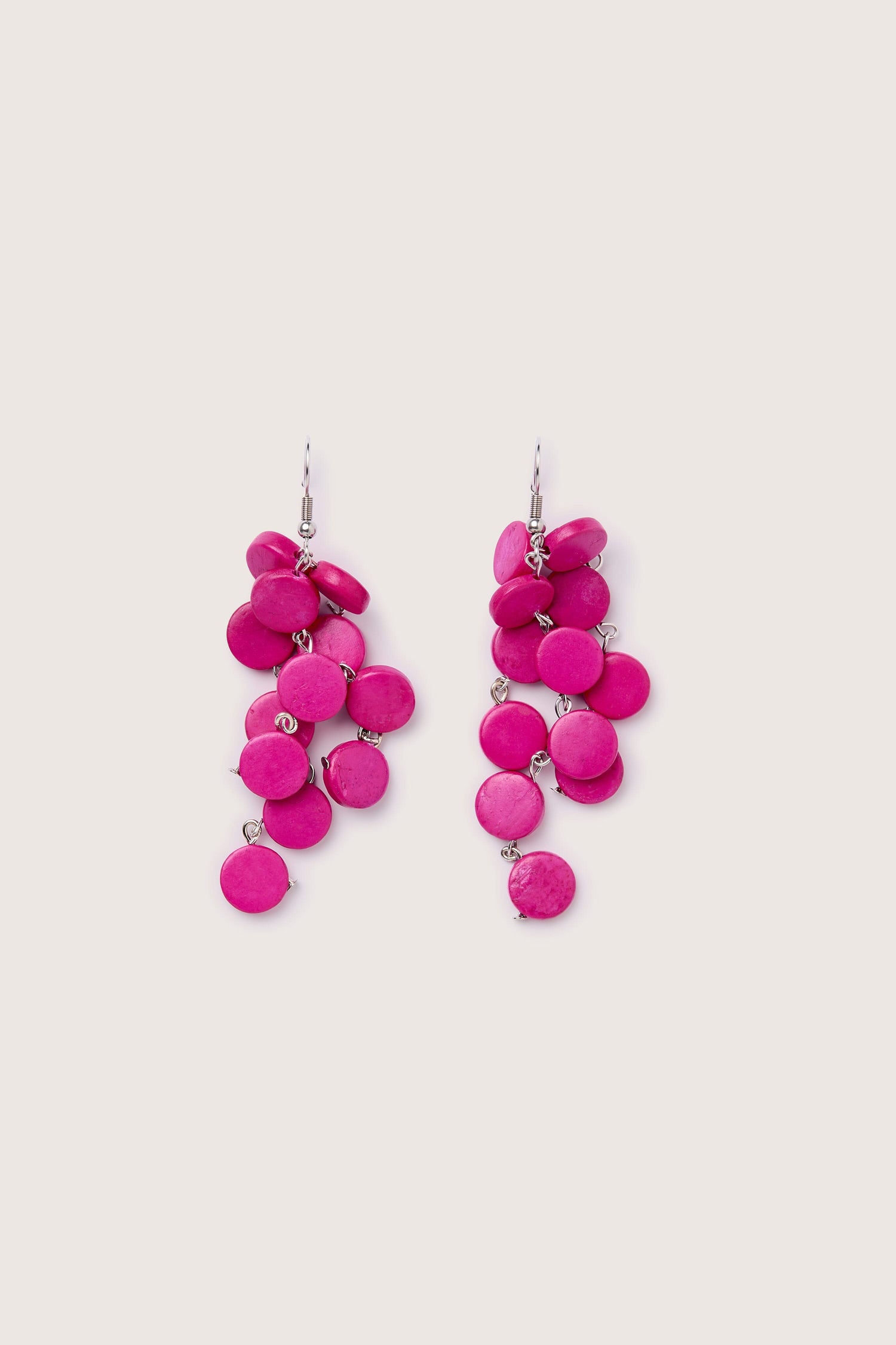 A handcrafted pair of Cascade Earrings on a white background.