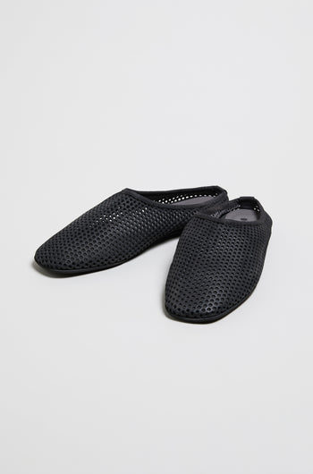A pair of Mesh Leather Slip on Shoes in black with a rounded toe, shown on a plain white background. Style SS26 LOFI10042—coming soon.