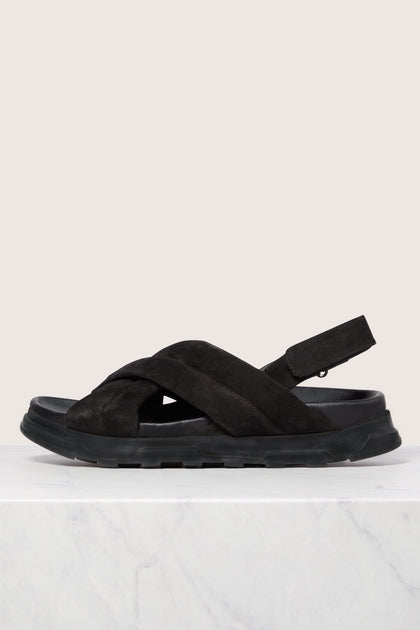 A single black Suede Crossover Sandal displayed against a white background.