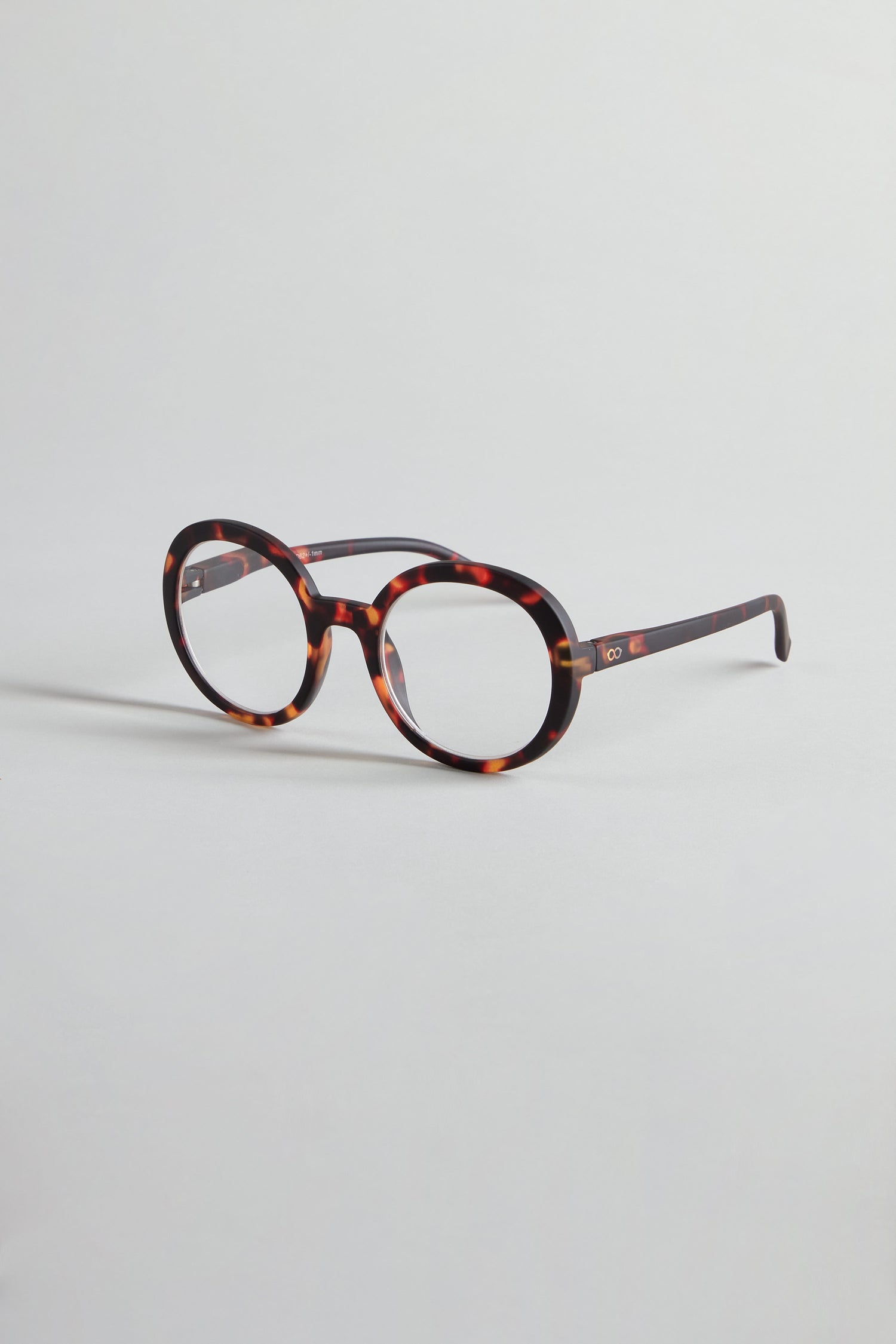 Tortoise Round Reading Glasses with dark and light brown patterns, optician-quality lenses, shown on a plain light background.