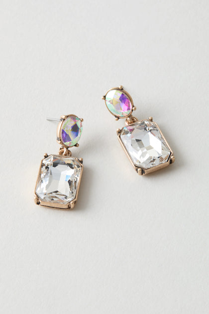 Twin Gemstone Earrings: Gold-framed, modern earrings with rectangular clear gemstones and small iridescent round stones—perfect for a statement on any occasion.