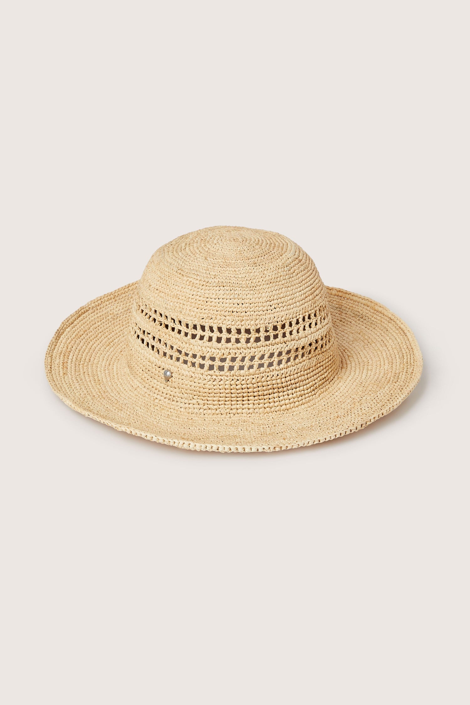 A wide-brimmed woven straw hat with openwork details around the crown, perfect for your summer wardrobe, set against a plain background. Product Name: Chapeau Westoloa