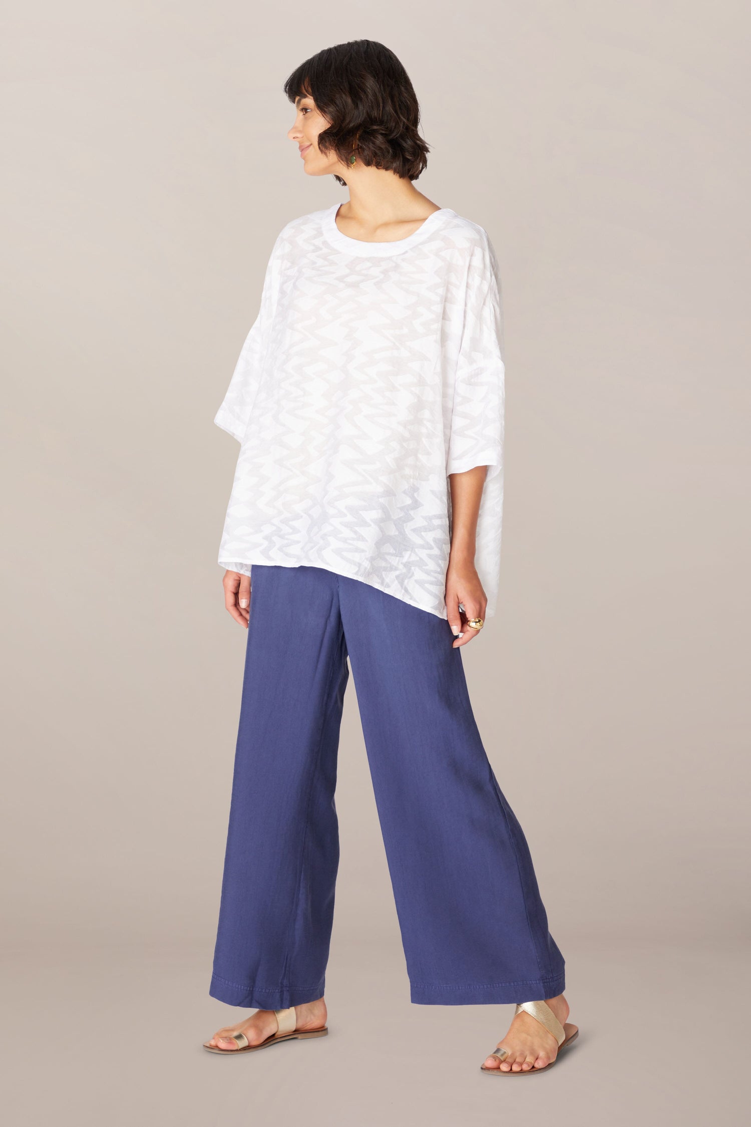 A woman wearing Soft Tencel Wide Trouser constructed with TENCEL LYOCELL fabric.