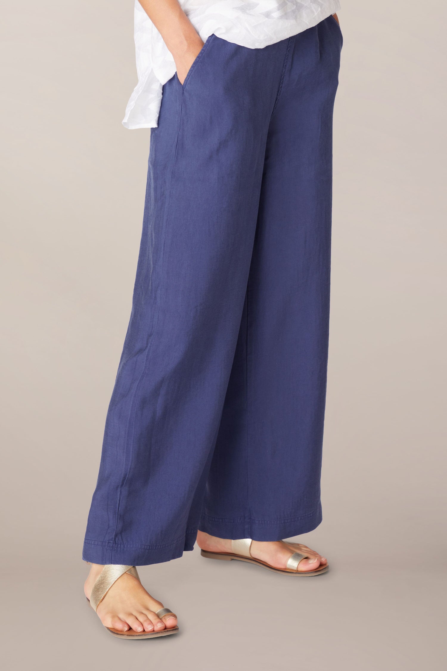 A woman wearing Soft Tencel Wide Trouser made from TENCEL LYOCELL fabric.