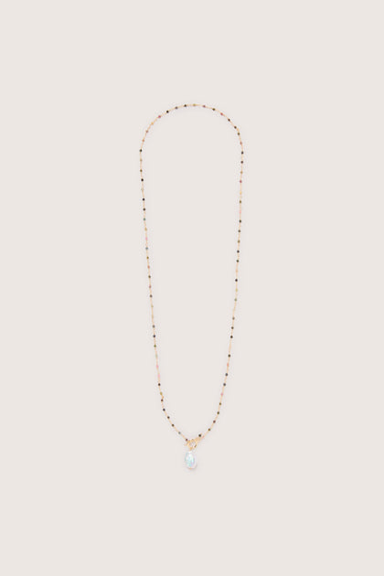 Gold necklace with a Freshwater Pearl Pendant on a white background, adding an elegant touch.