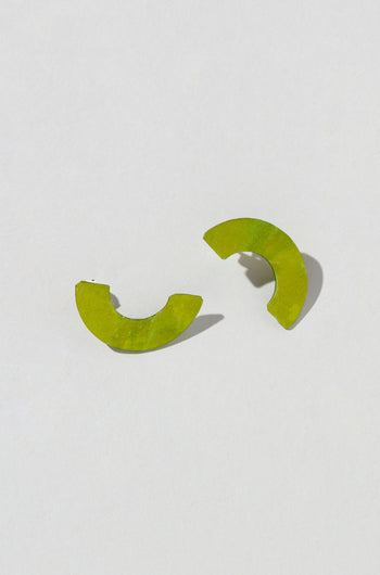 Two Aluminium Crescent Earrings, product code OAE399, in green lie on a light gray background.