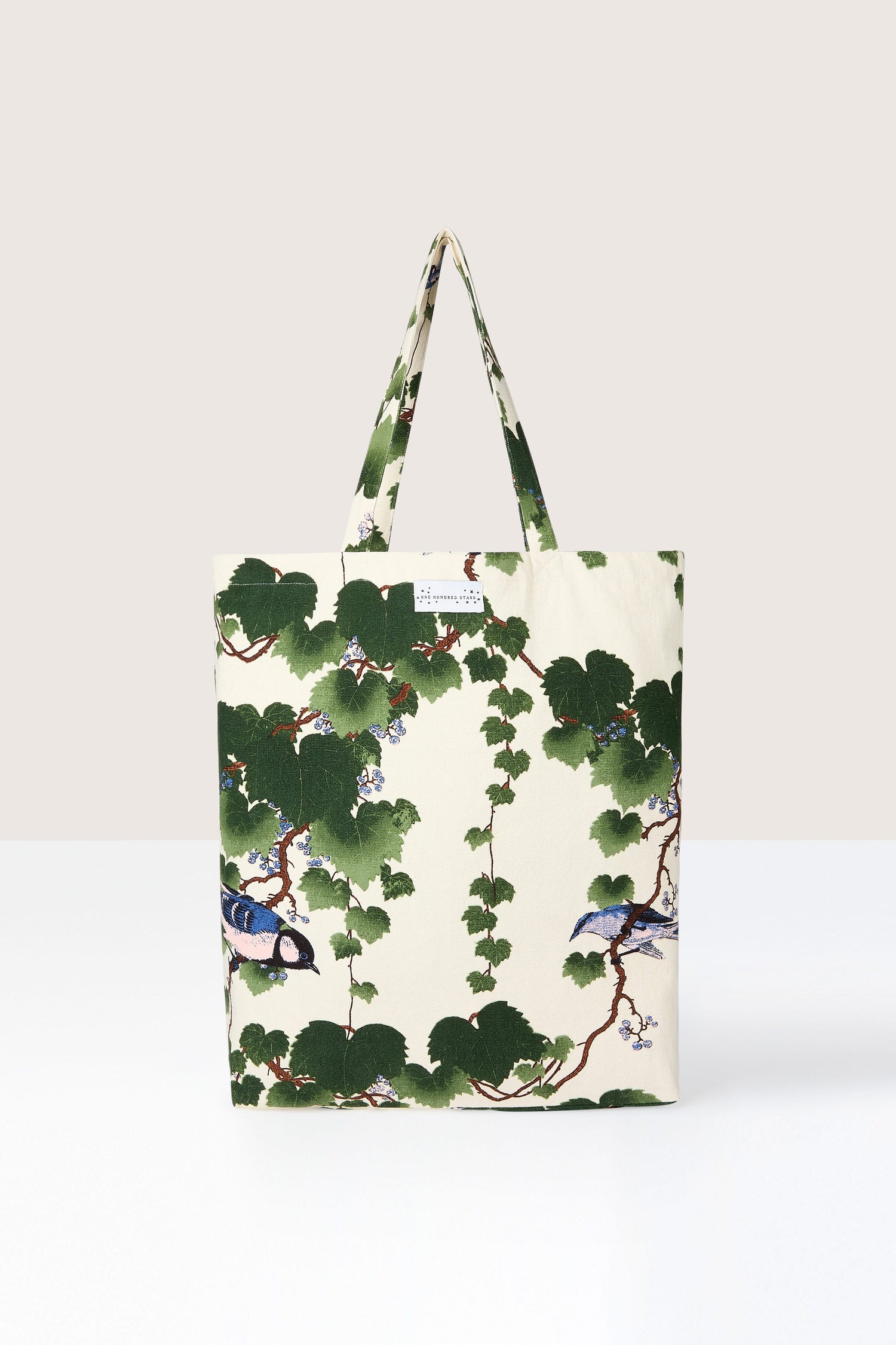 Floral patterned Acer Canvas Bag on a plain background.