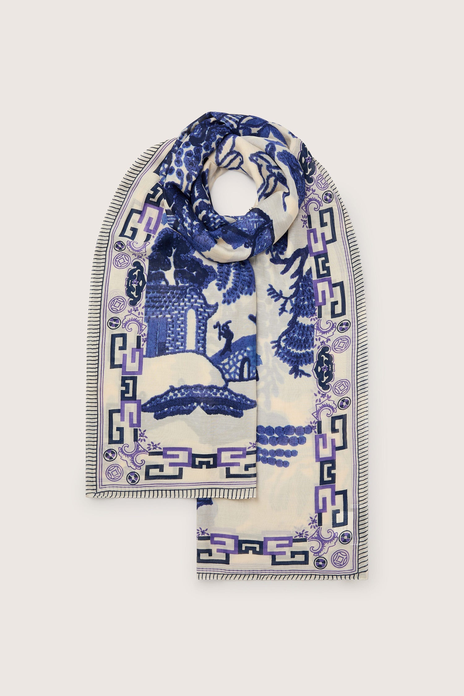 Decorative blue and white Willow Print Scarf, showcasing traditional pottery patterns on a white background.