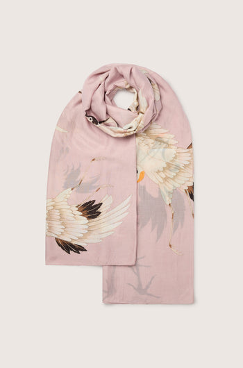 Elegant pink modal Stork Scarf with a crane bird design, draped against a white background.