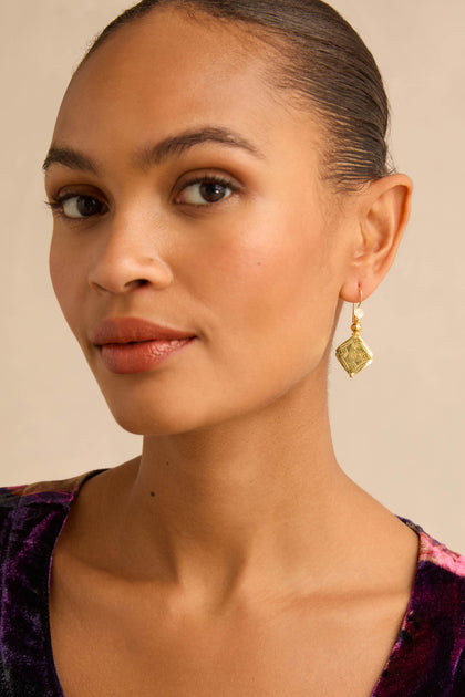 Gold-Plated Square Drop Earrings featuring an incised surface with geometric details.