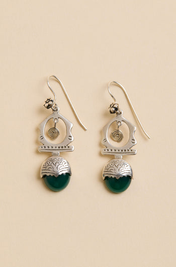 Green Onyx Drop Earrings: Sterling silver drops with spiral and geometric designs and green semi-circular stones, shown on a beige background.