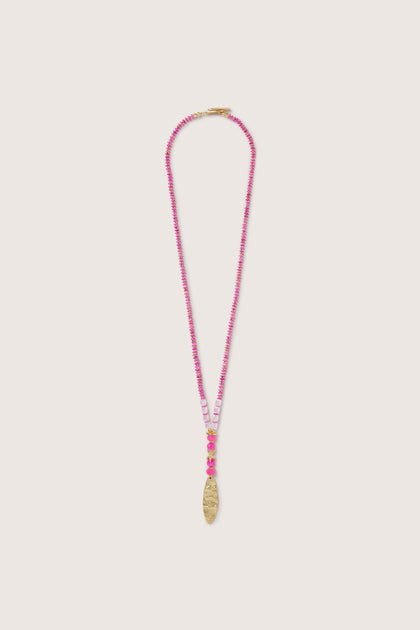 A bohemian accessory with a Gold Bead Pendant.