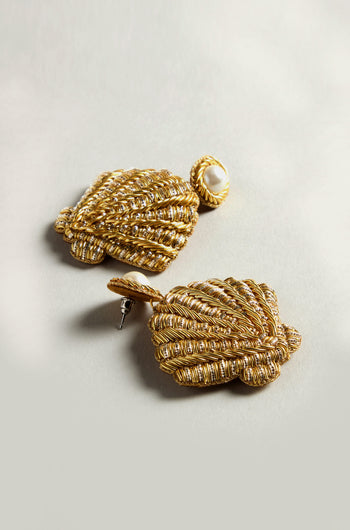 Two Hand Embroidered Golden Shell Glass Pearl Earrings with subtle elegance are displayed on a light gray background.