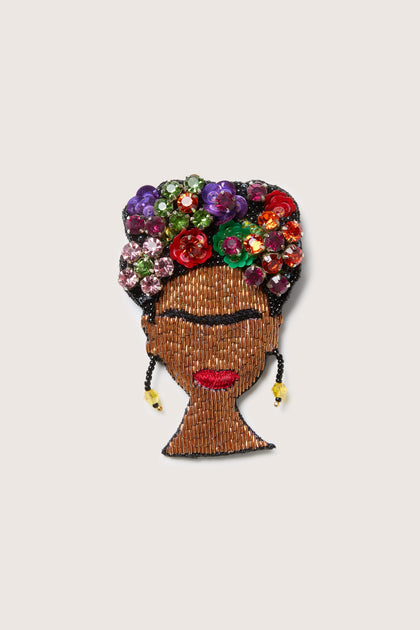 A timeless Hand Beaded Frida Brooch, perfect for any art lover.